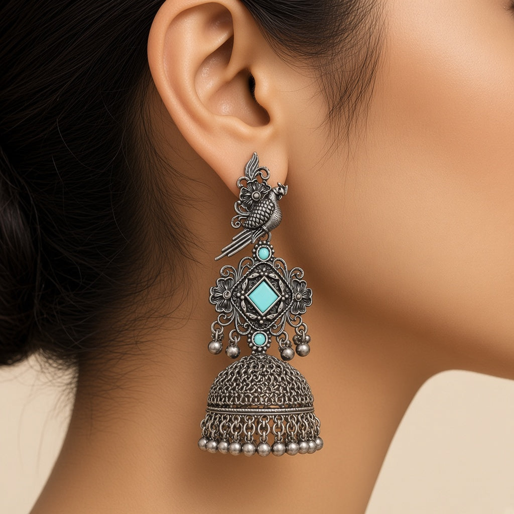Tota Oxidised Parrot Jhumkas in Turquoise - worn close-up (faceless model)