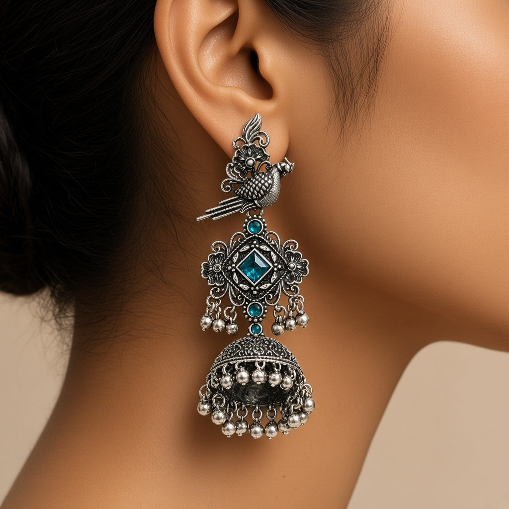 Tota Samundari Teal Blue Oxidised Parrot Jhumkas - worn close-up (faceless model)