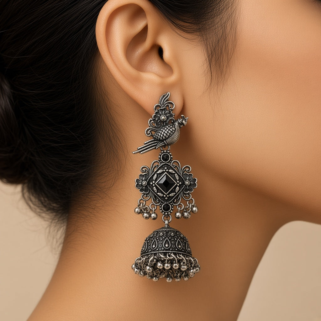 Tota Kaali Black Oxidised Parrot Jhumkas - worn close-up (faceless model)