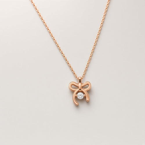 Bandhan Bow Pendant Necklace rose gold bow necklace by The P.S Collection - studio view