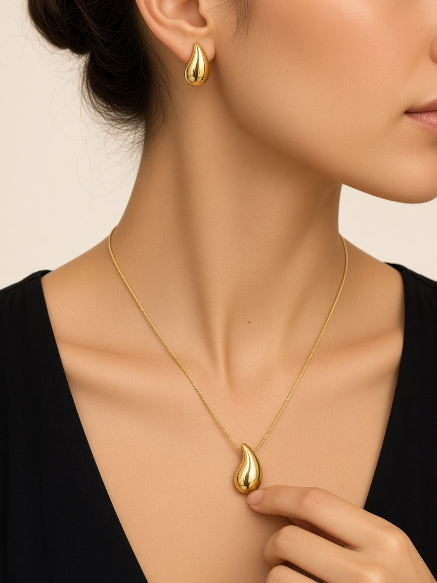 Boond Gold Teardrop Pendant Set - worn close-up (faceless model)