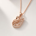 Hansa Swan Pendant Necklace rose gold swan necklace by The P.S Collection - studio view