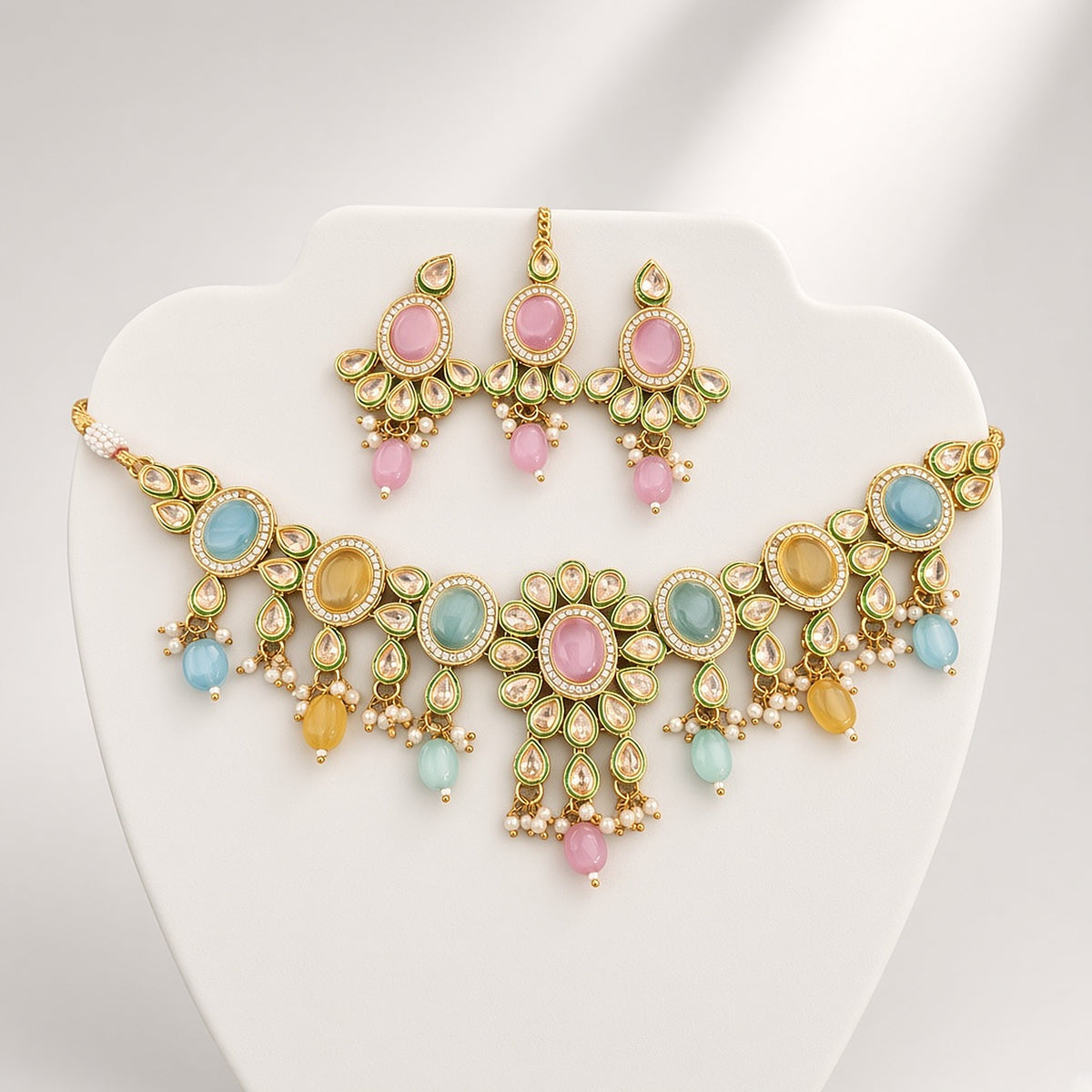 Komal Pastel Kundan Choker Set by The P.S Collection - studio view on an ivory bust
