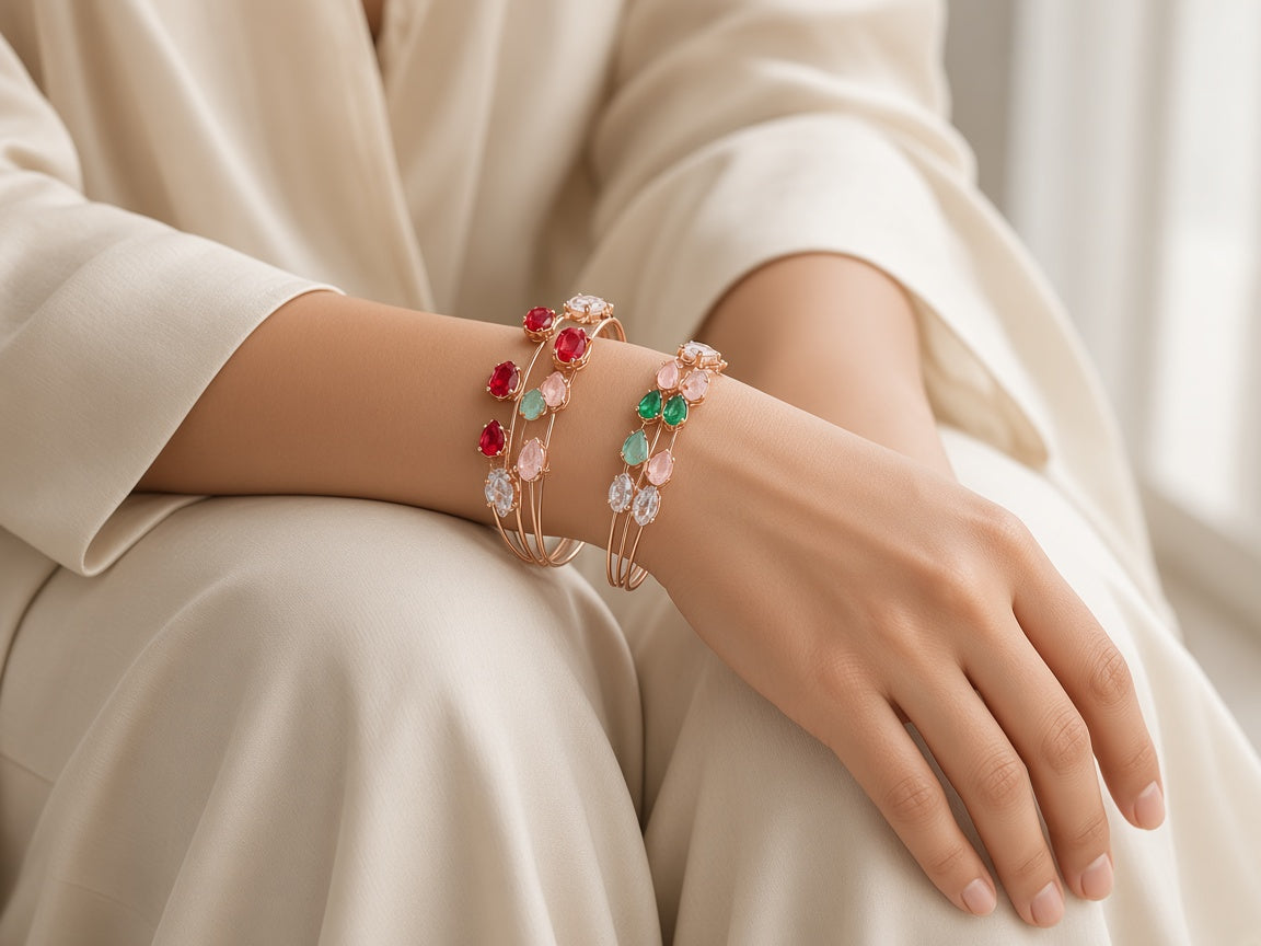 Lalit Rose Gold Wire Cuffs stacked on the wrist with an ivory silk kurta - on model