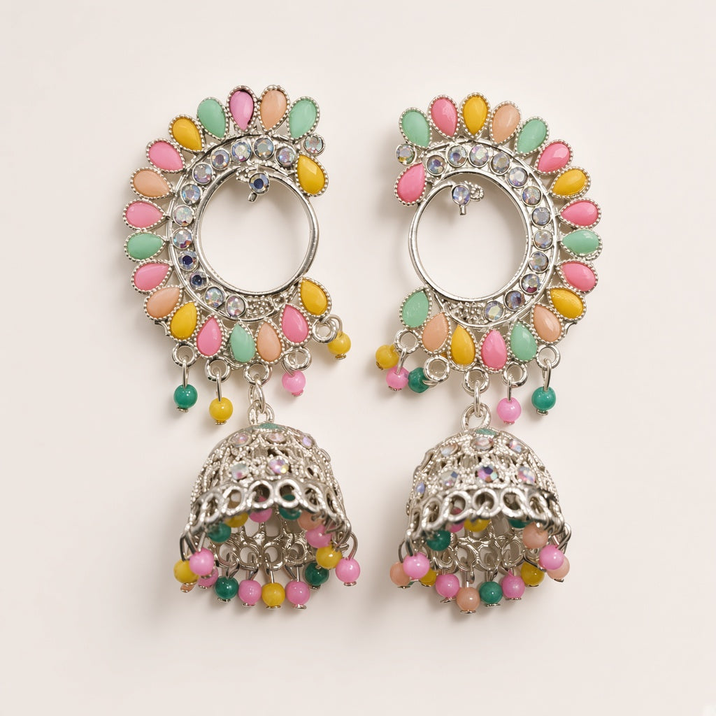Mayur pastel chandbali jhumkas in oxidised silver, studio shot on cream background