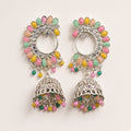 Mayur pastel chandbali jhumkas in oxidised silver, studio shot on cream background