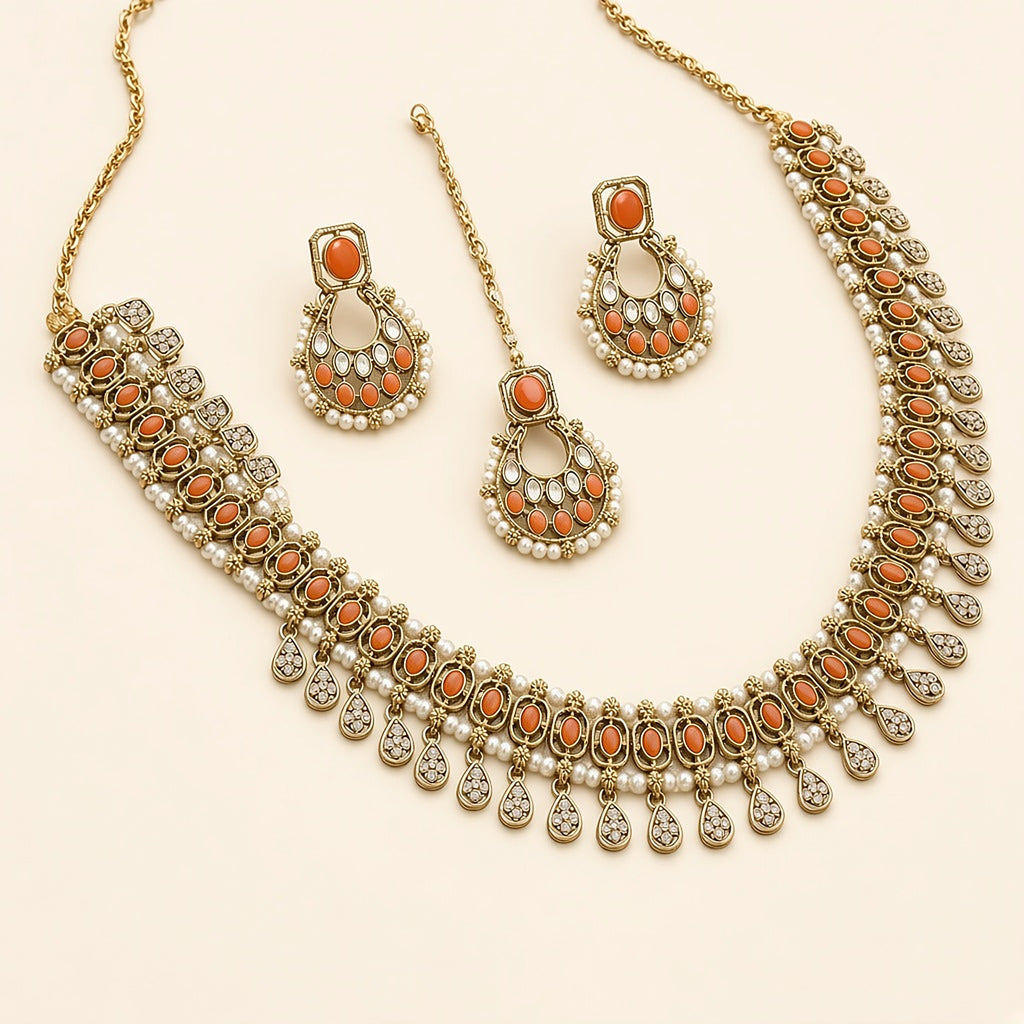 Narangi Orange Chandbali Necklace Set with Maang Tikka – studio view