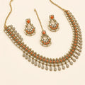 Narangi Orange Chandbali Necklace Set with Maang Tikka – studio view