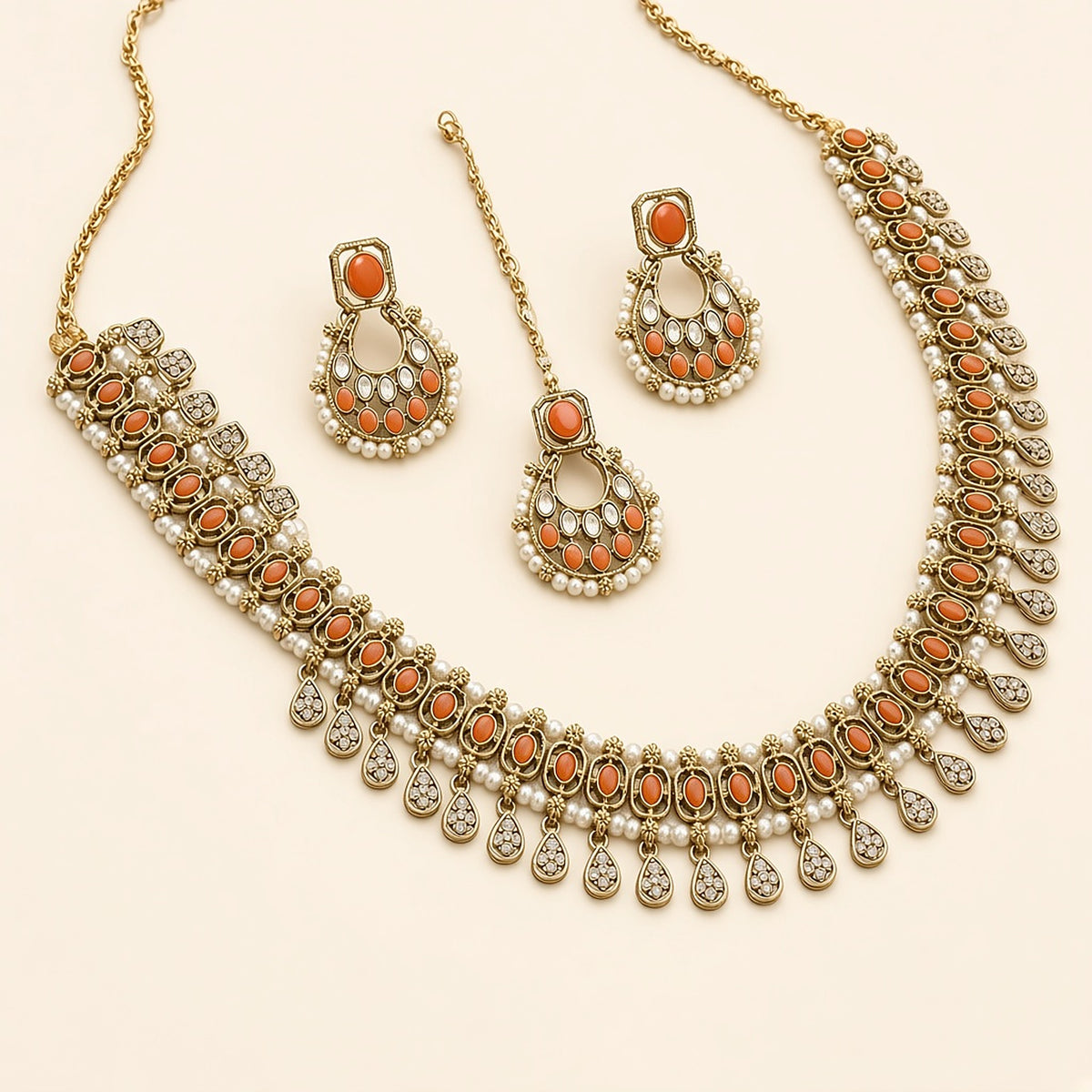 Narangi Orange Chandbali Necklace Set with Maang Tikka – studio view