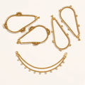 Nritya gold-tone rhinestone payal anklets in Paisley Pair, Classic Line Pair and Double Chain styles, studio shot