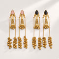Nupur long ghungroo chain earrings in Blush Pink and Onyx Black, studio shot on cream background