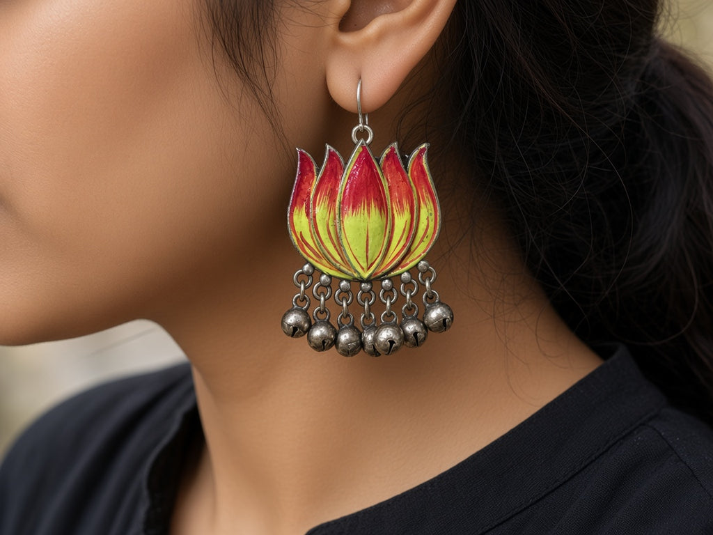 Padma lotus enamel ghungroo earring worn on the ear