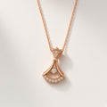 Pankha rose-gold-tone fan pendant necklace with centre stone and pavé scalloped hem, studio shot