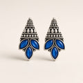 Parna oxidised crown drop earrings with blue marquise stones, studio shot