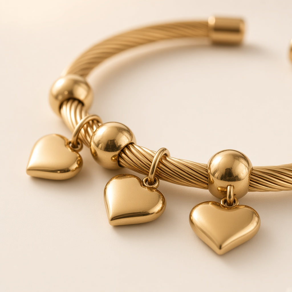 Pyaar cuff close-up of the twisted cable and heart charms