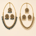 Rajwadi antique gold polki-style necklace sets in Teal Blue and Pearl Ivory with matching earrings and maang tikka, studio shot
