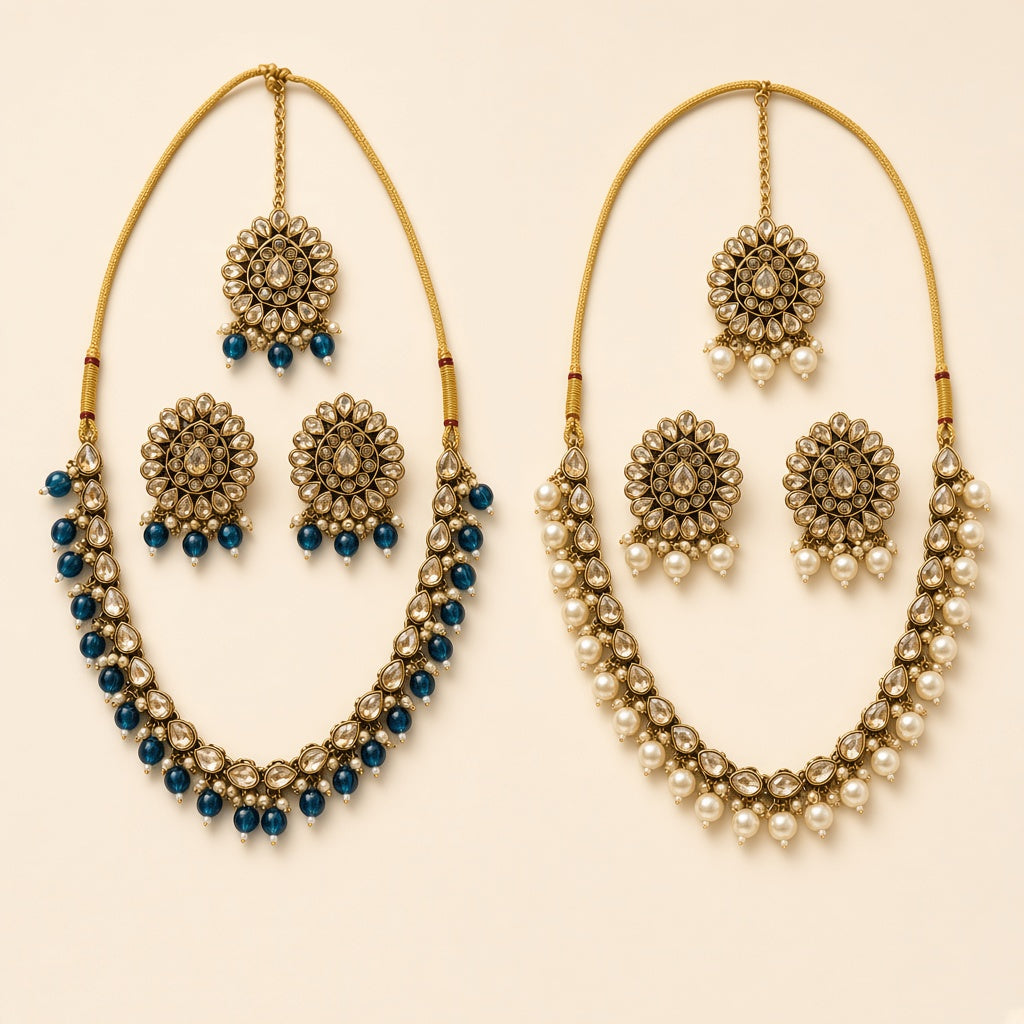 Rajwadi antique gold polki-style necklace sets in Teal Blue and Pearl Ivory with matching earrings and maang tikka, studio shot