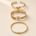 Sakhi gold-tone hinged bangles in Butterfly, Clover Mesh and Heart styles, studio shot