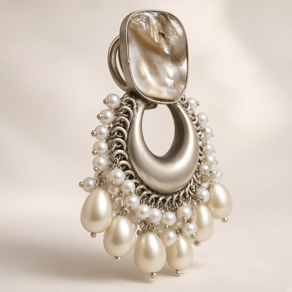 Seep chandbali close-up of the shell-look top, polished crescent and faux pearl teardrops