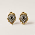 Shyama two-tone oxidised peacock teardrop studs with black centre stone and gold beaded border, studio shot