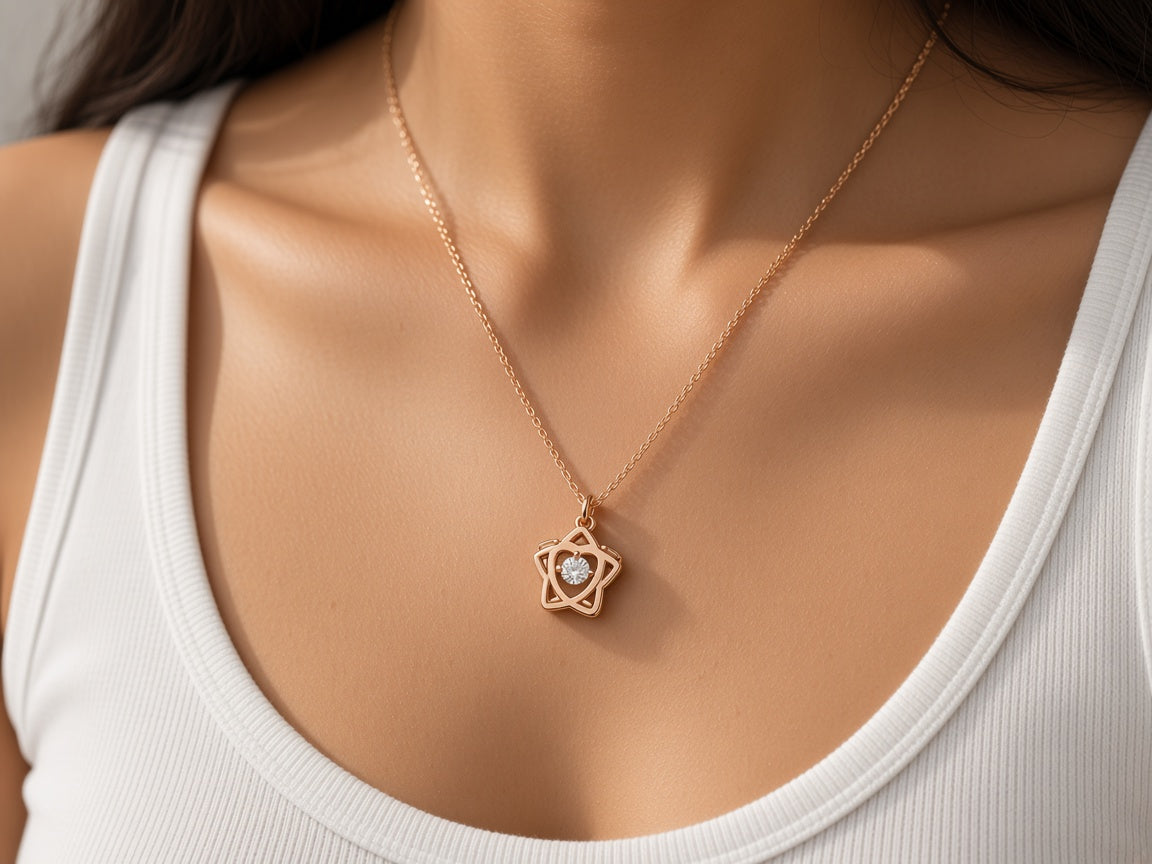 Tara star pendant necklace worn at the collarbone