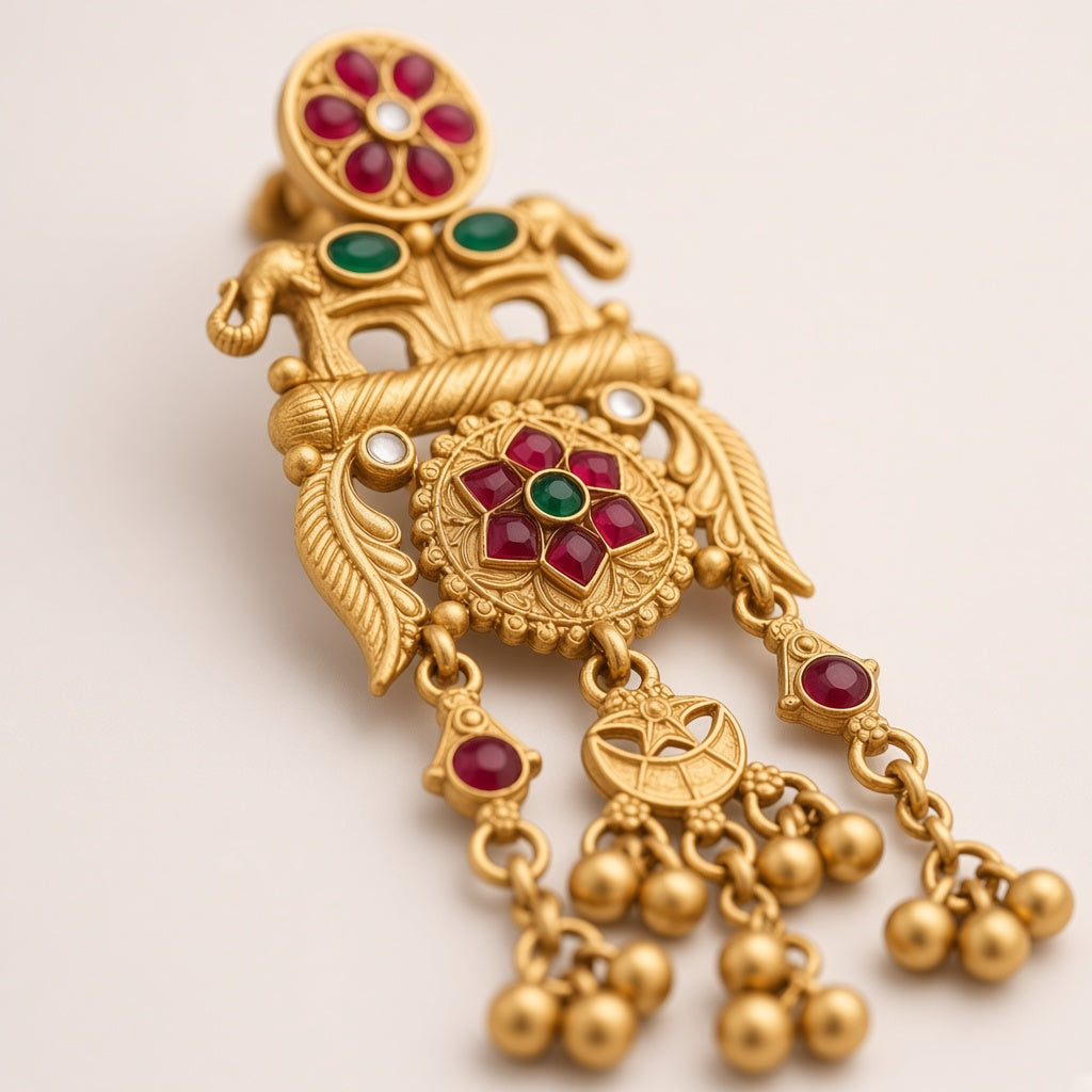 Utsav temple earring close-up of the elephants, flower medallion and crescent charm